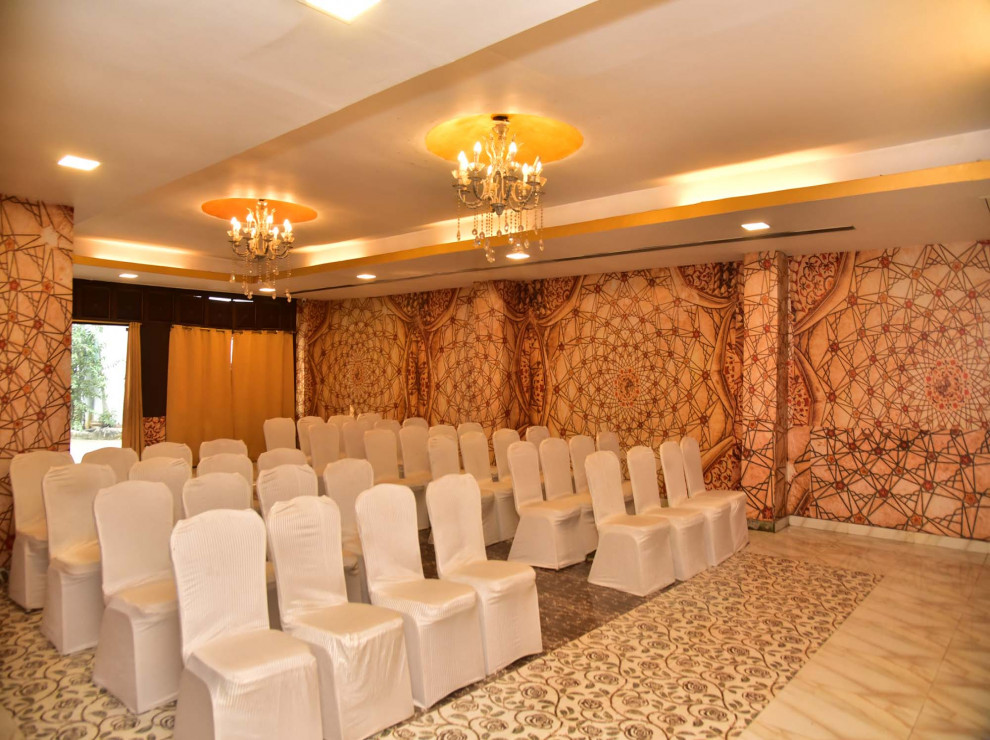 white color chairs arranged at Patliputra Hotels Bord  room in Patna